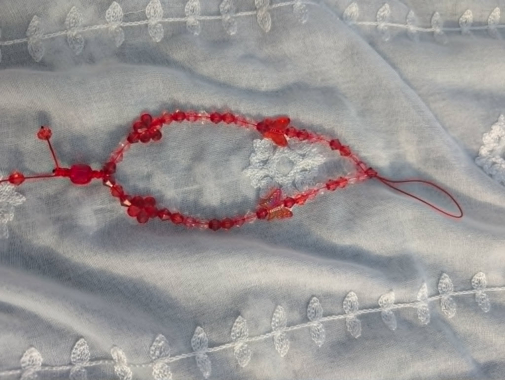 Bracelet Dragonne Rouge Papillon – Téléphone & Sac | Bijou Artisanal
